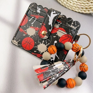 Silicone bead keychain with black card holder featuring red basketball and logo prints