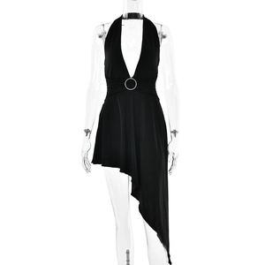 Detail of sexy halter neck dress with deep V-neck, waist metal ring, and asymmetric hem