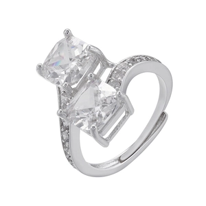 Macro detail of silver adjustable open ring featuring two square cubic zirconia stones