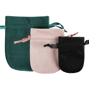 Luxury velvet drawstring pouches in green, pink, and black, available in three sizes
