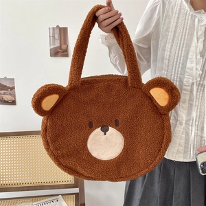 Detailed plush brown bear shoulder bag featuring soft fleece texture and cute 3D ears