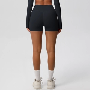 Rear view of high-waisted black yoga shorts featuring butt-lifting seams and quick-dry fabric