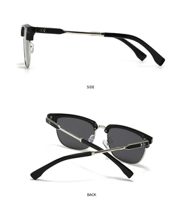 Close-up of square sunglasses with black frame and silver metal temples featuring arrow detail
