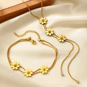 Elegant gold flower tassel necklace and bracelet set in stainless steel for women