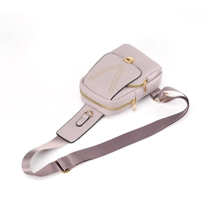 Light purple studded chest bag for women with gold hardware and adjustable strap
