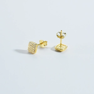 Detailed macro view of S925 sterling silver square stud earrings with pave-set cubic zirconia
