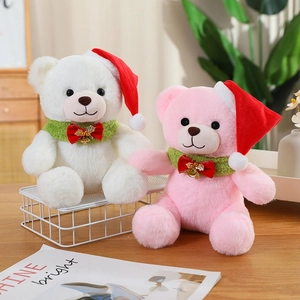 Christmas teddy bear plush toy set in white and pink with festive hats and scarves