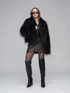 Chic look with black faux fur coat, brown leather wrap skirt and tall boots