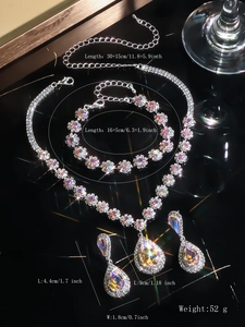 Detailed view of luxury silver rhinestone jewelry set featuring colorful teardrop earrings