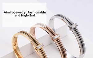 Three-color titanium steel bangles set with crystals and buckle clasp detail
