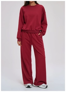 Deep red round neck sweatshirt and wide-leg drawstring pants set with a relaxed fit