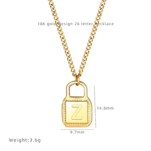 Macro detail of gold Z-letter lock pendant showing 14.8mm height and 9.7mm width