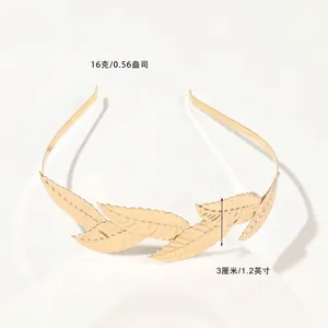 Detail of golden metal leaf headband featuring textured Roman style leaves and 3cm width