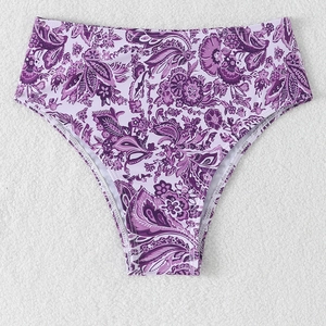 Detail view of high waisted bikini bottoms with purple paisley and floral print pattern