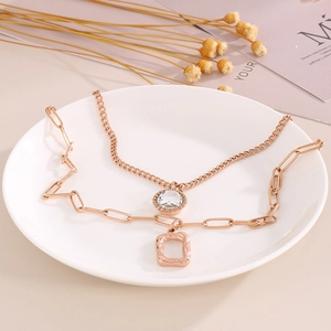 Double-layered necklace with rose gold chain, crystal pendant and rectangle charm