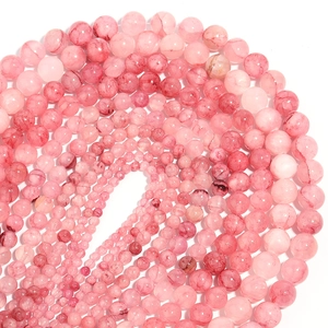 Spiral layout of pink Persian jade round beads with natural ice textures for jewelry DIY