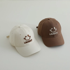 Detailed view of LAUGHTY embroidery and smiley face on cotton baseball caps