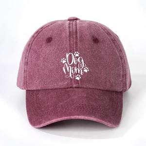 Vintage dark purple washed cotton baseball cap with white Dog Mom print and paw motif