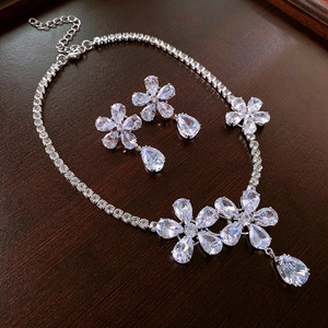 Elegant zircon flower jewelry set featuring drop necklace and matching earrings