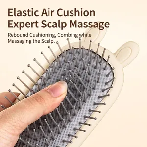 Cartoon rabbit hairbrush with elastic scalp massage air cushion and round-tip pins