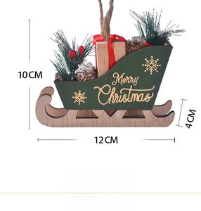 Detailed view of a wooden Christmas sleigh ornament with Merry Christmas text and size specs