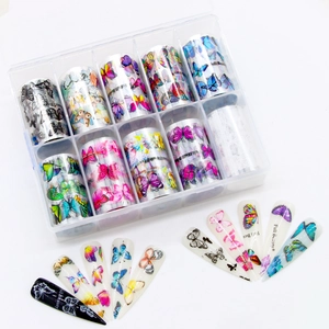 Nail art transfer foil set with colorful butterfly designs and clear storage case