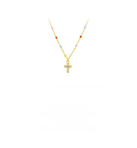 Detail of gold cross necklace featuring colorful enamel beads and center zircon stone