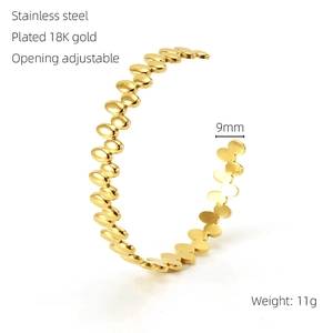 Macro detail of 18K gold plated stainless steel bracelet with 9mm wide segment design