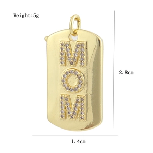 Detail view of 18K gold plated MOM pendant with dimensions 2.8cm by 1.4cm and 5g weight