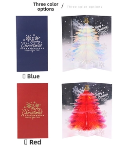 Detail of 3D pop-up Christmas cards featuring honeycomb tree and foil stamped covers