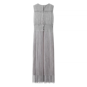 Detail of silver sleeveless knitted dress featuring intricate fringe and metallic thread