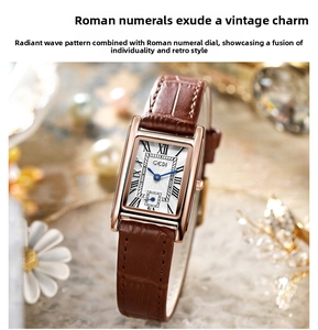 Macro shot of rectangular rose gold vintage watch dial with brown leather strap detail