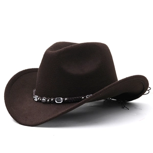 Close-up of brown wool cowboy hat featuring intricate ethnic beaded hatband and wide brim