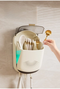 Detail of 40-degree tilted wall-mounted kitchen utensil holder with dustproof cover