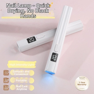 Detail of white handheld UV LED nail lamp with digital timer screen and blue curing light