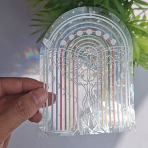 Holographic suncatcher sticker with moon phases and rainbow prism light effect