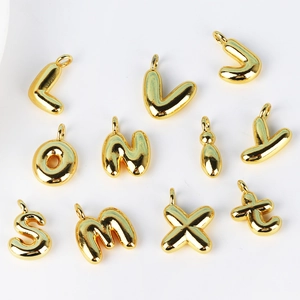 Hip hop style gold balloon alphabet letter pendants with a shiny metallic finish