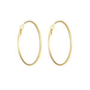 Detailed macro view of large polished golden stainless steel hoop earrings with pin closure
