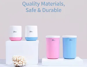 Detail view of pink and blue matte pet paw cleaners on white geometric stands