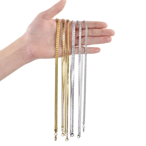 Sleek flat snake bone chain necklaces in gold and silver stainless steel for a modern look