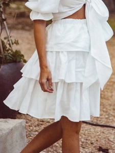 White puff sleeve crop top and tiered ruffle skirt set in breathable linen fabric