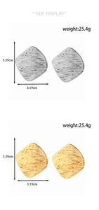 Detail of gold and silver textured square earrings showing dimensions 3.39cm by 3.19cm
