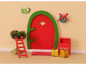 Detailed Christmas dollhouse set with red elf door, ladder, mailbox and festive ornaments