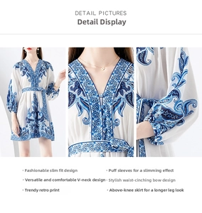 Detail view of V-neck and puff sleeves on a white paisley print vintage mini dress
