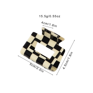 Black and white checkerboard square hair claw clip with size measurements 5cm x 4.5cm