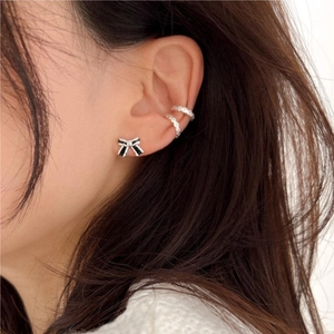 925 Sterling silver bow stud earring and ball ear cuffs set on woman's ear