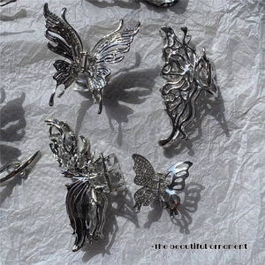 Irregular liquid metal silver butterfly hair clips set with hollow and sparkling details