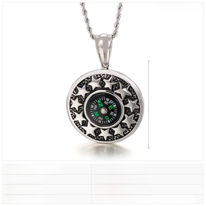 Detail of 45mm punk stainless steel compass pendant with star relief on a twisted rope chain