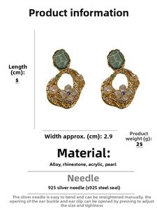 Detail of vintage flower earrings with green stones, pearls, and S925 silver needles