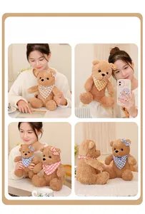 Detail showing plush teddy bear with plaid scarf and bow tie in soft home setting